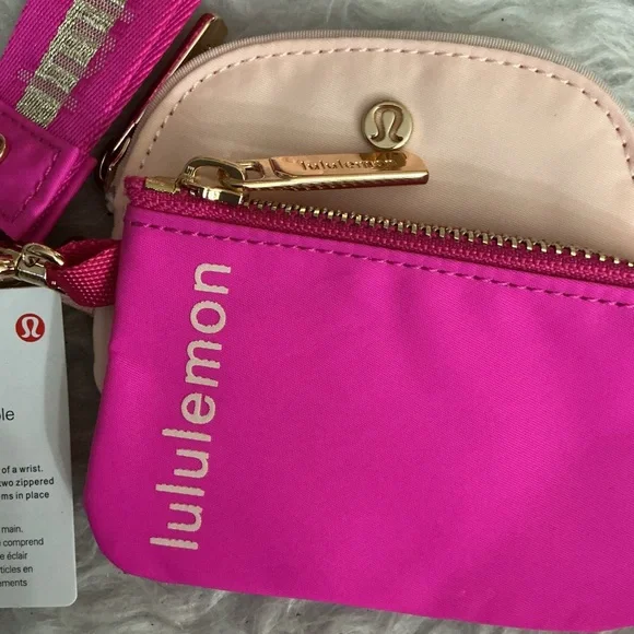 lululemon athletica Vibrant Pink and Soft Cream Wristlet - Picture 2 of 3